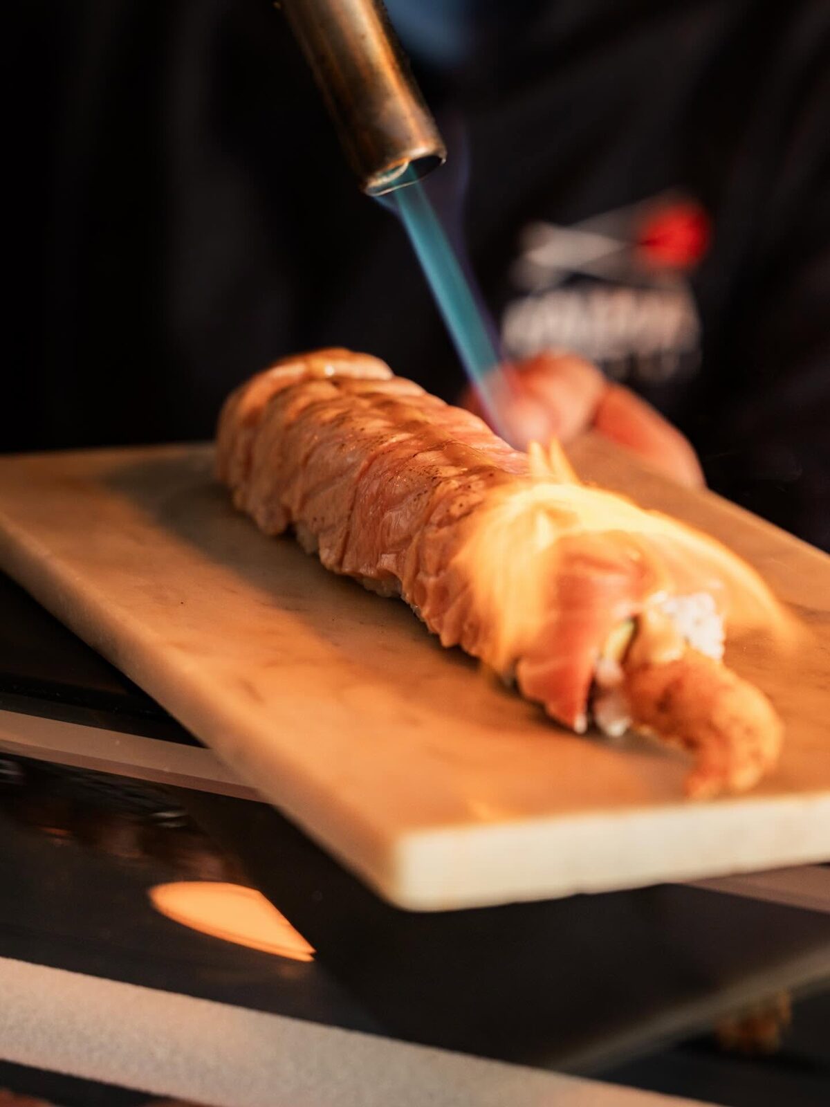 Ura Bicho being torched at the counter
